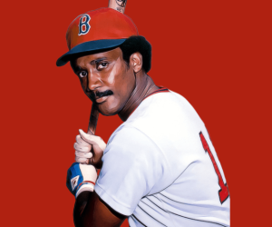 Jim Rice swings bat at Fenway Park.